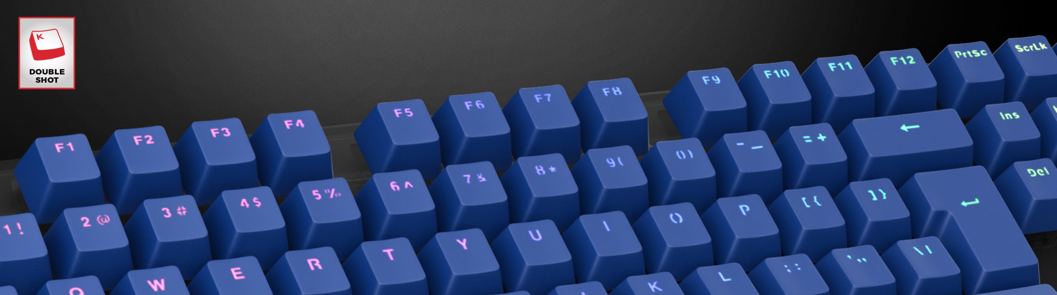 Keycaps bleus à double frappe comportant des lettres illuminées, conçus pour un clavier mécanique. Élégant et durable pour les joueurs.