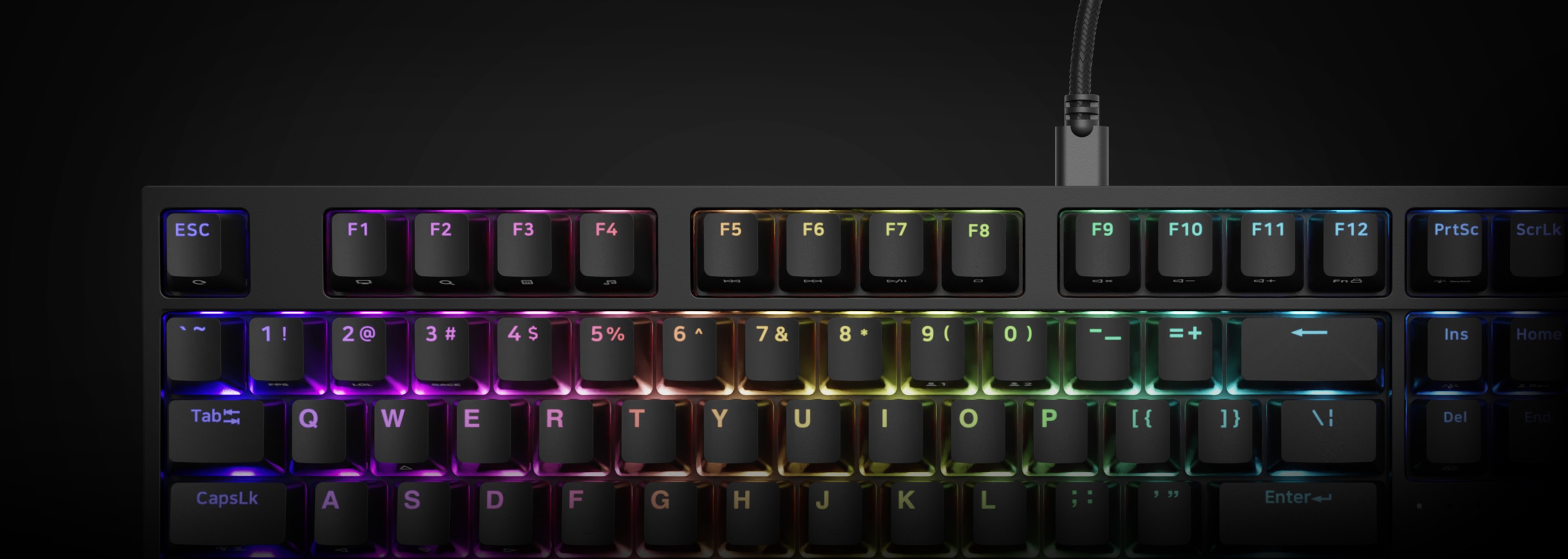 Clavier de jeu mécanique avec rétroéclairage RVB et commutateurs Gateron Yellow Pro, doté d'un design compact et d'une palette de couleurs noires.