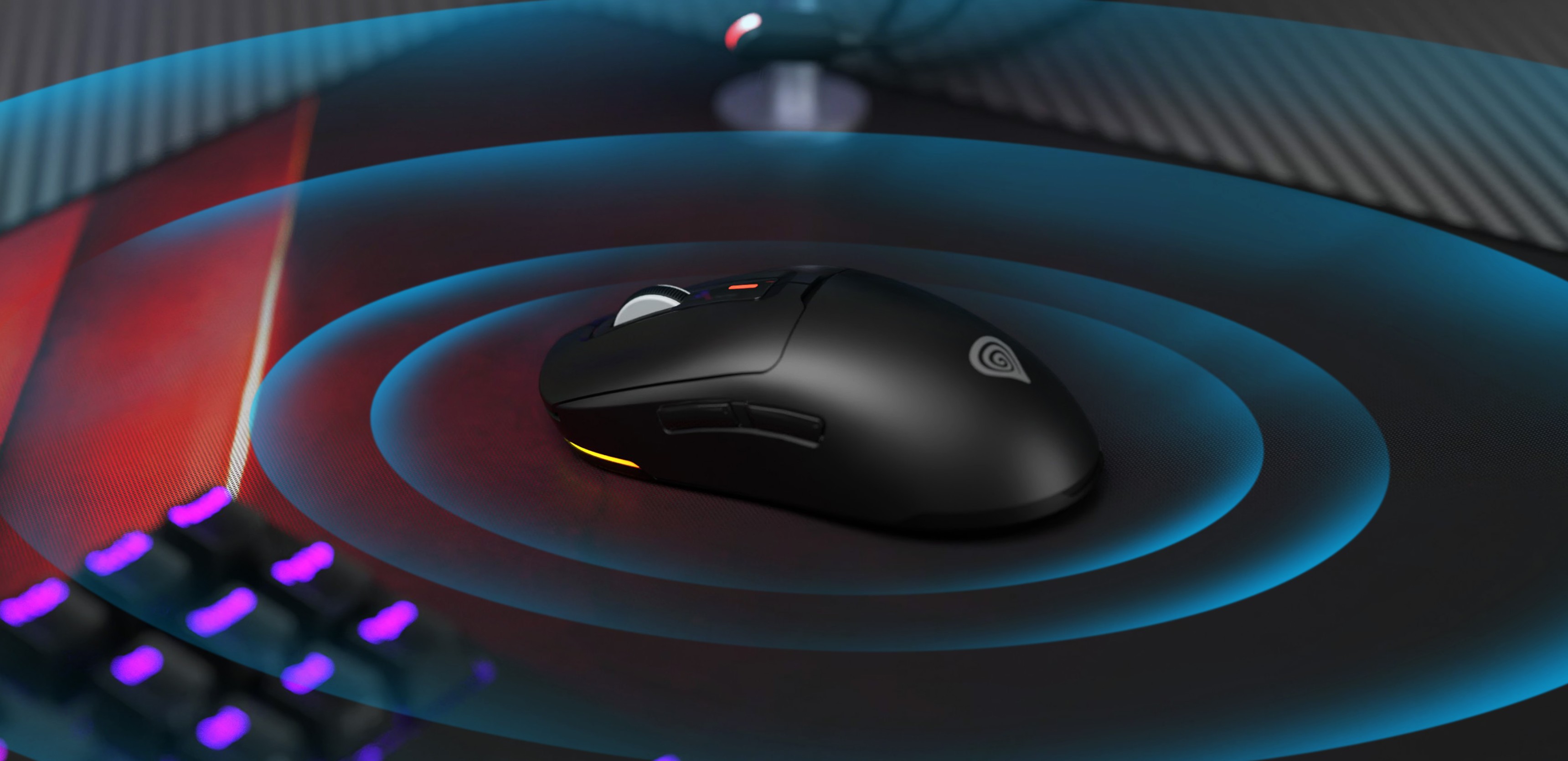 Souris de jeu sans fil Genesis Zircon 660, dotée d'un design noir élégant et d'un capteur de 12 000 DPI, posée sur un tapis de souris de jeu.