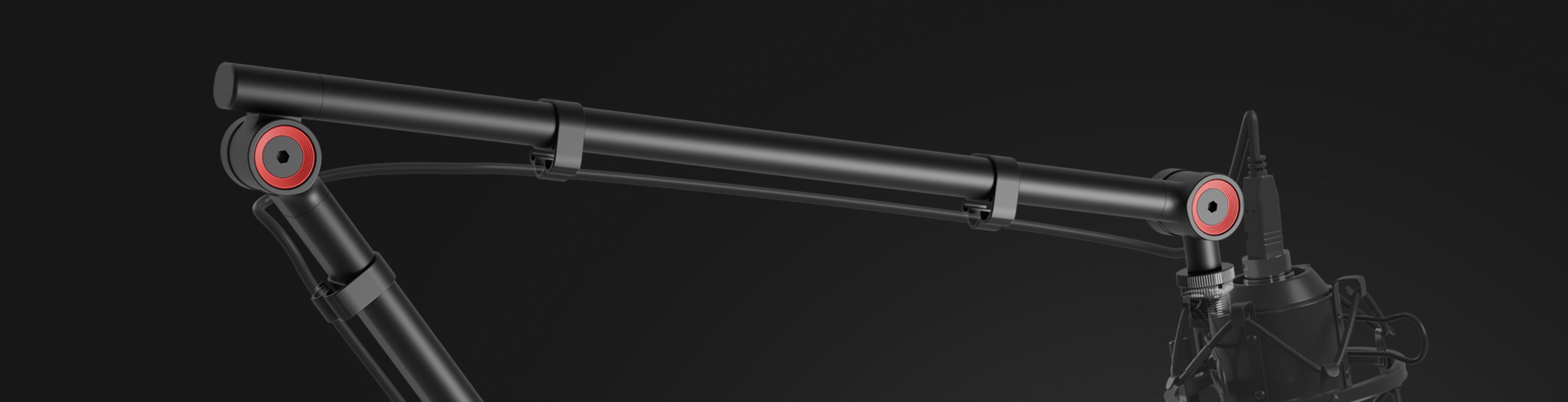 Bras de microphone avec support pour casque d'écoute, doté d'un design noir élégant et d'accents rouges, idéal pour les configurations d'enregistrement.