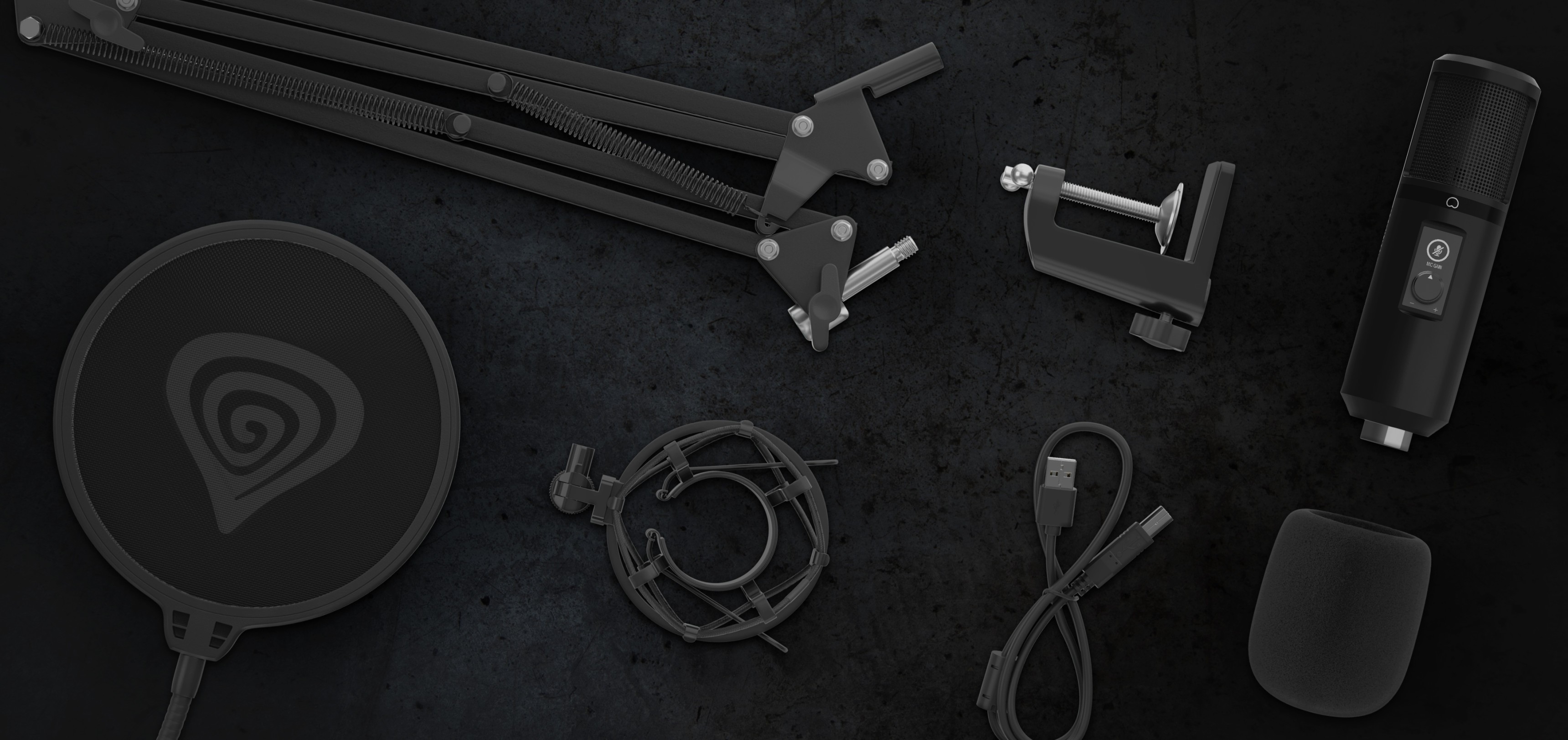Kit de microphone noir comprenant le Genesis Radium 400 G2, un filtre anti-pop, un bras réglable, un câble USB et une pince de montage.