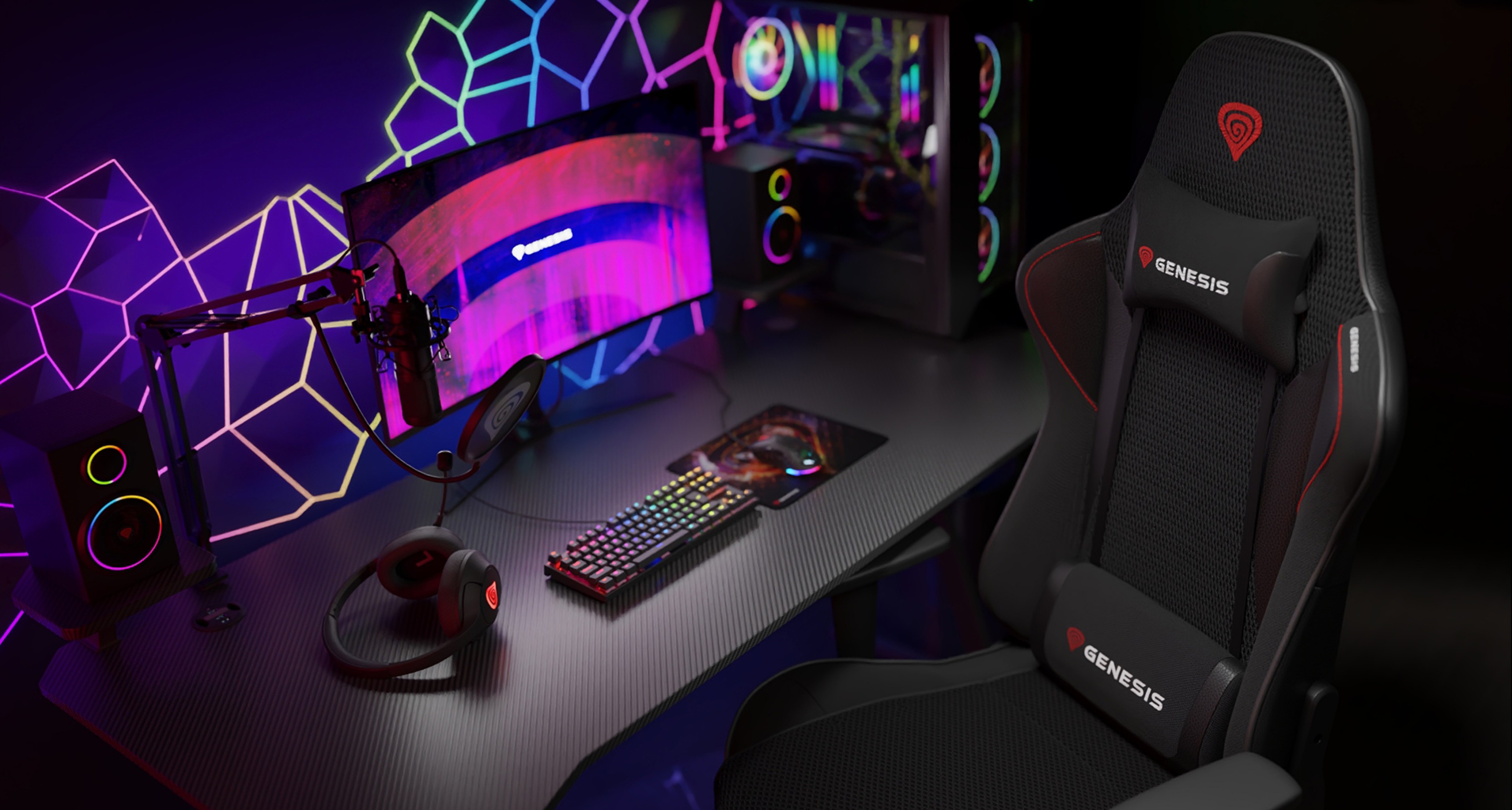 Fauteuil de jeu en maille Genesis Nitro 440 G2 noir positionné à côté d'une installation de jeu élégante avec un moniteur vibrant et des périphériques RVB.