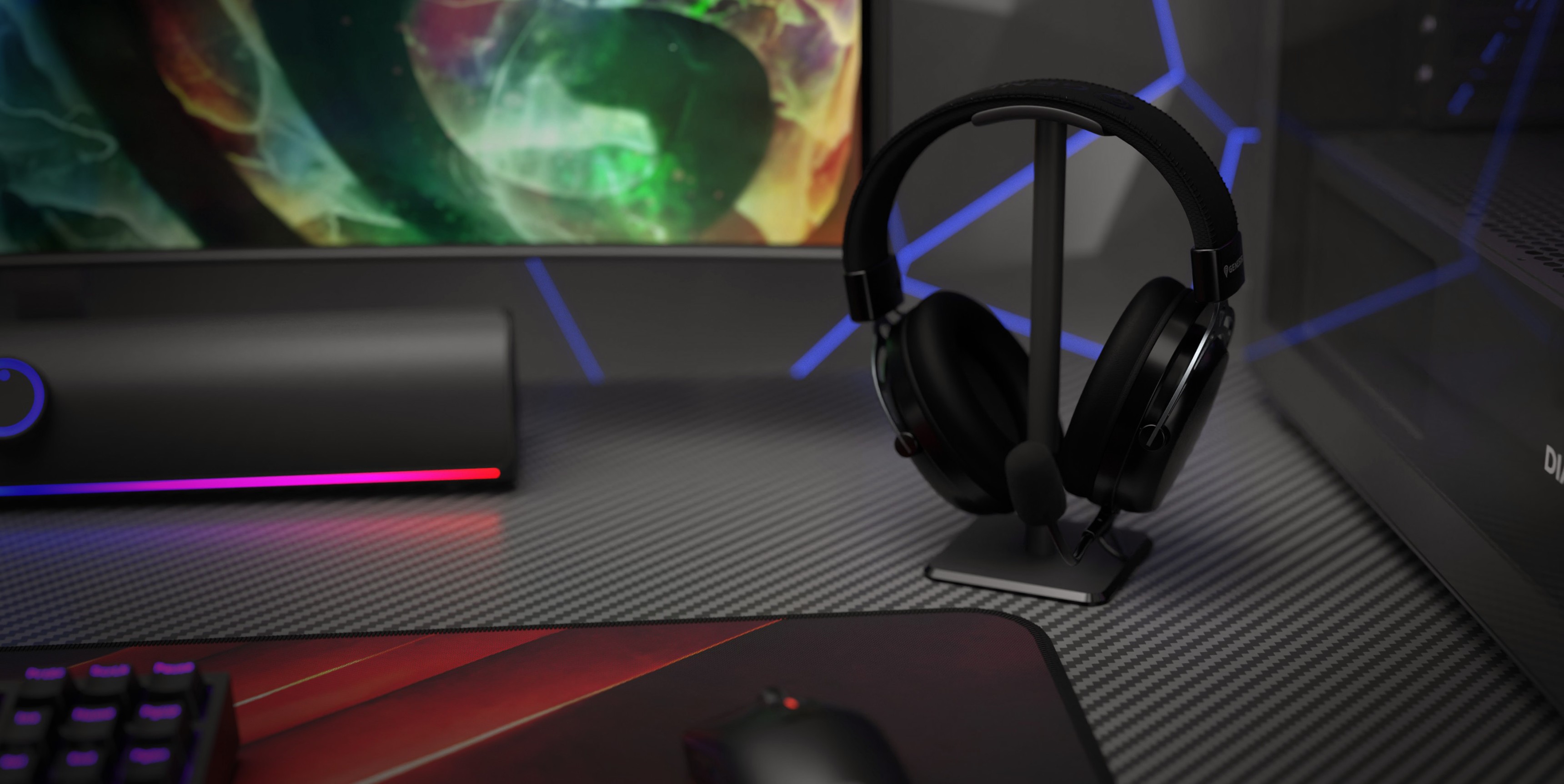 Support de casque noir pour Genesis Thulium 100, positionné sur un bureau de jeu avec une surface texturée et un éclairage RVB coloré.